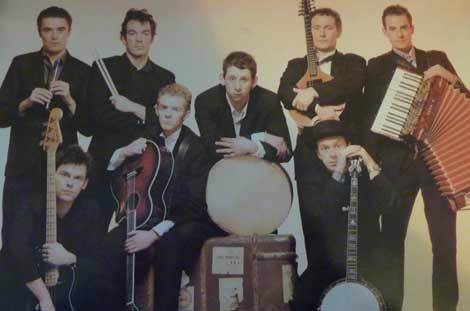 The Pogues combine traditional Irish music with the spirit of punk rock